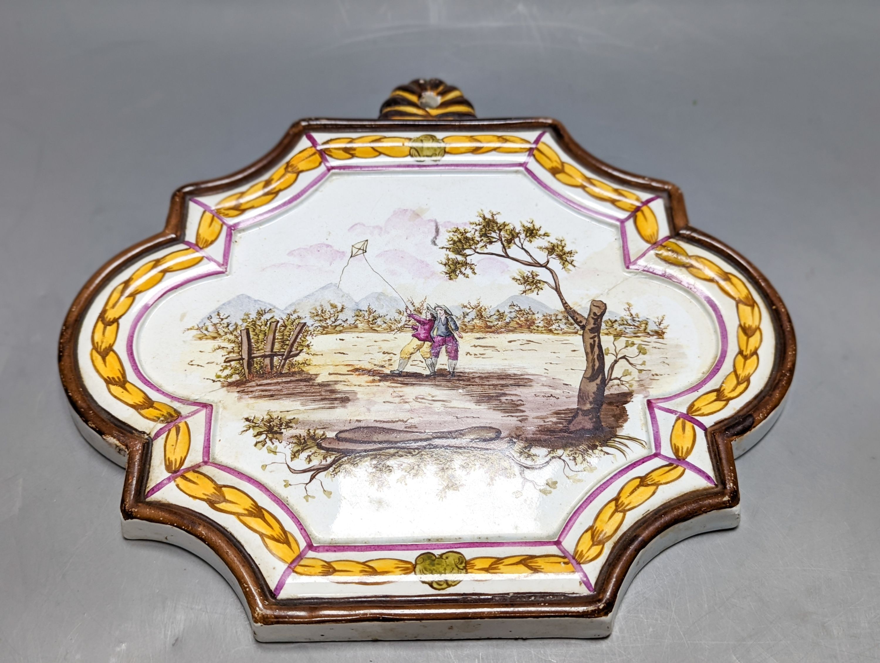 A pair of 19th century painted faience plaques in the style of Veuve Perrin 23cm